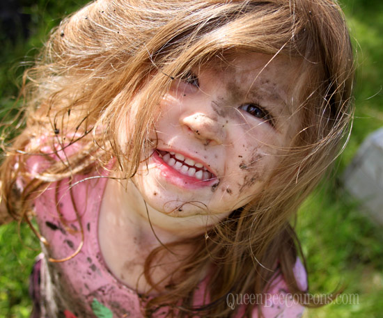 Playing-in-the-mud-smiles-june-7