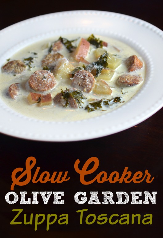Slow Cooker Olive Garden Zuppa Toscana - Copycat version of Olive Garden's sausage, potato and kale soup. Made in the slow cooker, this recipe requires little prep time!